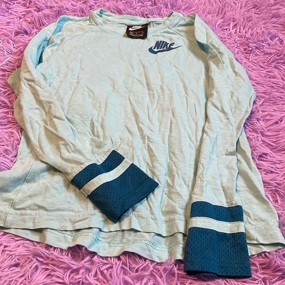 Blue Nike long sleeve shirt with a light weight material
